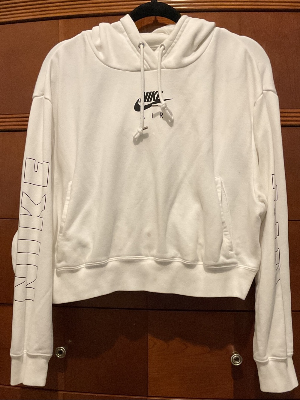 Nike White Pullover Hoodie with Black Swoosh and Sleeve Outline